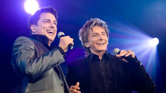 John Barrowman and Barry Manilow performing in 2009