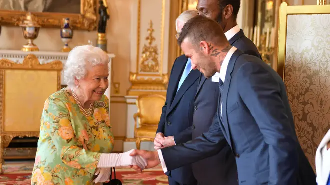 The Queen meets David Beckham at Buckingham Palace