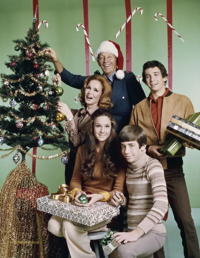 Bing Crosby with his family, including daughter Mary at the front