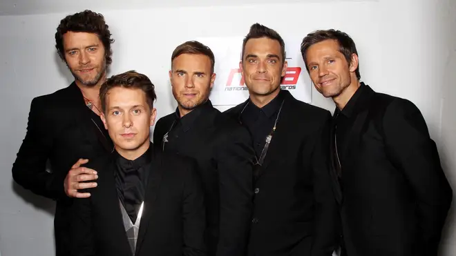 Take That in 2011, with Jason Orange far right