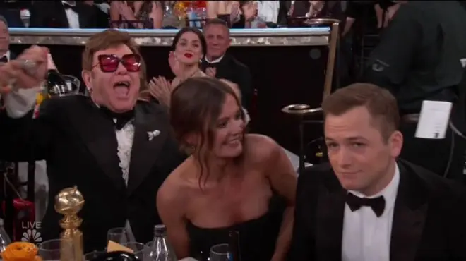 Elton cheering on Taron