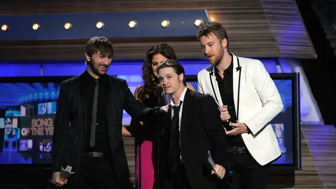 Josh Kear (in front) with Lady Antebellum after winning Song of the Year in 2010