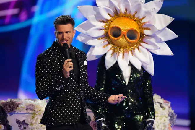 The Masked Singer: Host Joel Dommett with Daisy