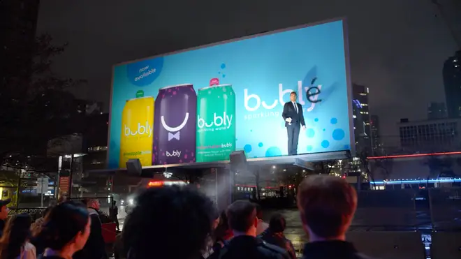 Michael Bublé in front of the billboard