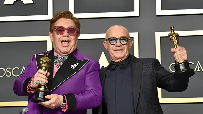 Elton John and Bernie Taupin with their Oscars