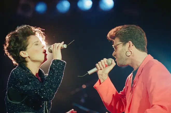George Michael and Lisa Stansfield performing at the Freddie Mercury tribute concert in 1992. George later said he was singing to Anselmo in the audience.