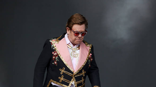 Sir Elton John walks off stage