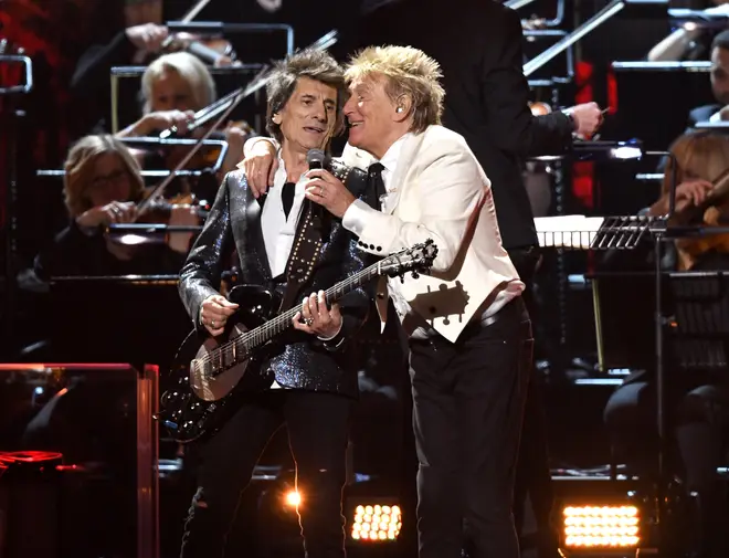 Rod Stewart and Ronnie Wood perform on stage at the BRITs 2020