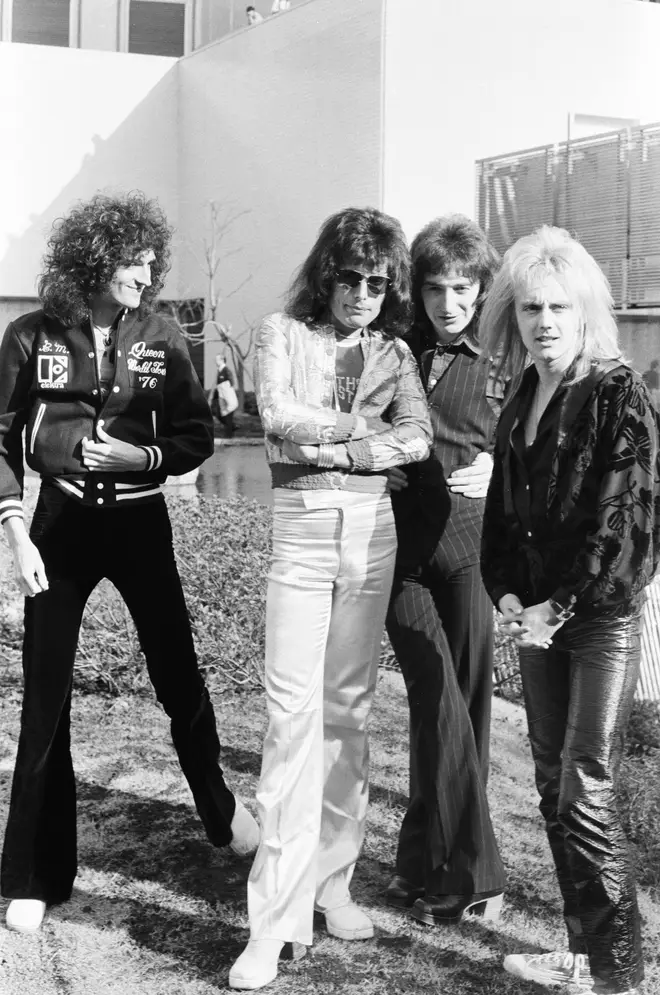 Photo session for 'Music Life' magazine, in the garden of Hotel Pacific Tokyo on their Night At The Opera Japan tour, Tokyo, Japan, 21 March 1976. L-R Brian May, Freddie Mercury, John Deacon, Roger Taylor.