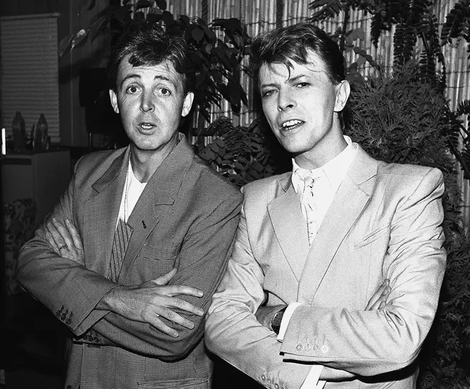 David Bowie posing with Paul McCartney backstage at Live Aid on 13th July, 1985.