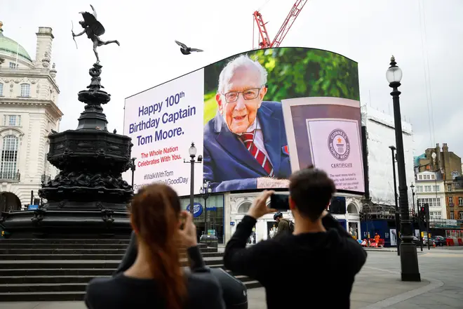 Colonel Tom Moore's birthday wishes from the nation are beamed across Piccadilly Circus