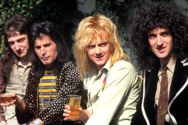 Brian May (far right) in Queen