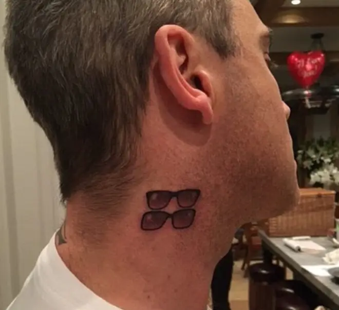 Robbie Williams Two Ronnies tattoo