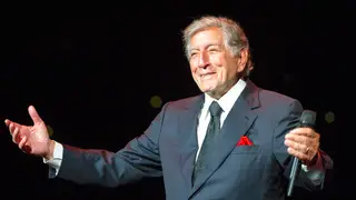 Tony Bennett performing at a concert