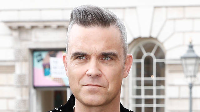 Robbie Williams is in lockdown in L.A. and cannot be with his father