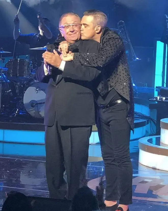 Robbie Williams often invites his father on stage to sing with him