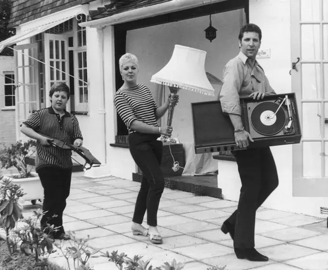 Tom Jones, wife Linda and son Mark, moving into their new home Sunbury in Surrey, 21st July 1967.