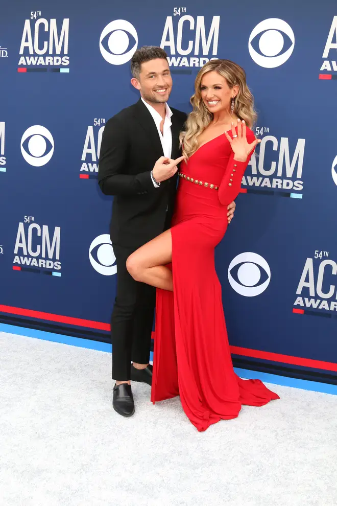 Michael Ray and Carly Pearce showing off their engagement at the ACM Awards