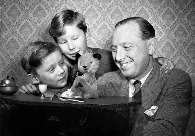 Harry Corbett with Sooty and sons David, 9, on the left, and Peter (better known as Matthew Corbett), aged 6, on the right.
