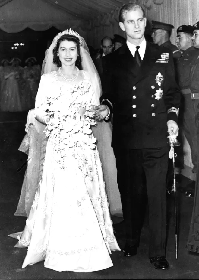 Queen Elizabeth II alongside the Duke of Edinburgh as they leave Westminster Abbey after their marriage ceremony. Princess Beatrice wore the same tiara.