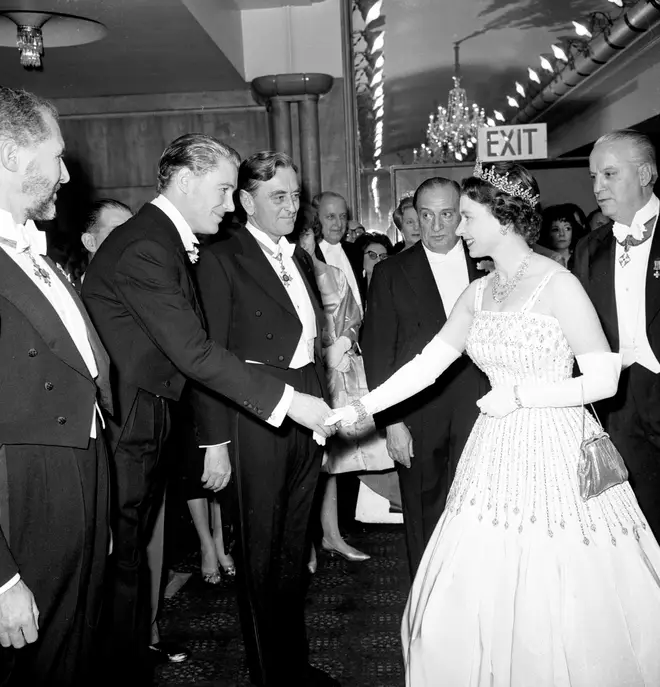 Queen Elizabeth II arriving at the Odeon, Leicester Square, London for the world charity premiere of the film Lawrence of Arabia