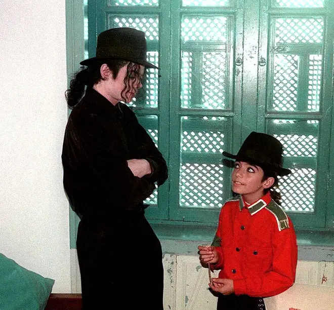 Omer Bhatti and Paris Jackson consider themselves brother and sister since birth. Pictured, Omer with Michael Jackson