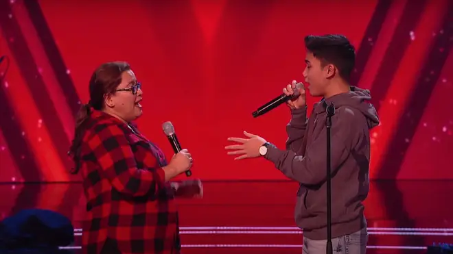 Joshua Regala, 14, and his mum Ysan perform on stage