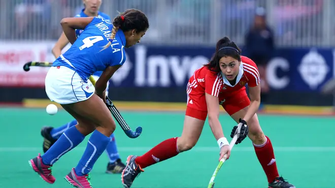 Sam Quek of England battles with Dalila Mirabella of Italy during the Investec Hockey World League quarterfinal match in London, 2013.