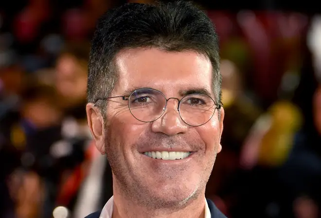 Simon Cowell is in hospital after breaking his back falling off a bike as his Malibu, California home.