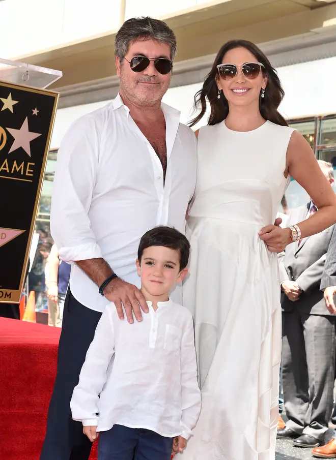 Simon Cowell pictured with his girlfriend Lauren Silverman and son Eric
