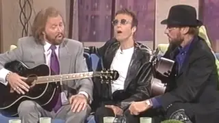 The Bee Gees gave an incredible acapella performance of 'How Deep Is Your Love' on a chat show. Pictured (L to R) Barry, Robin and Maurice Gibb. in 1998