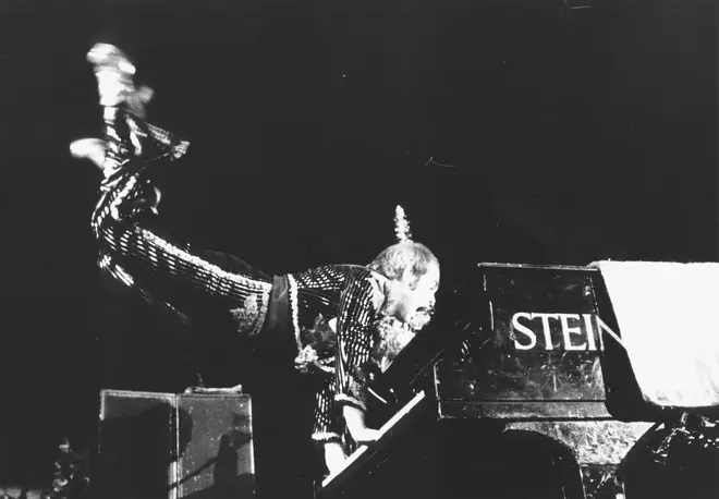 Elton John recreating his famous levitating act from the Troubadour at the Christmas Show in Hammersmith in 1974