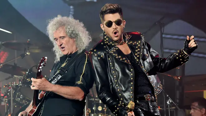 Musician Brian May and singer Adam Lambert perform at the Forum on July 3, 2014 in Inglewood, California.