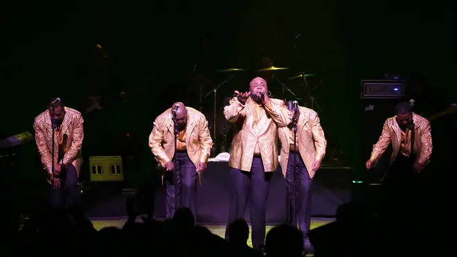 Singer Bruce Williamson performing with The Temptations