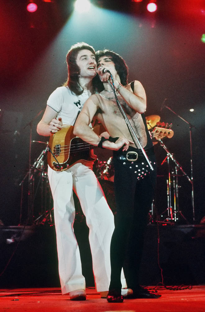 John Deacon and Freddie Mercury were very close during their years in the band and John was devastated when he died in 1991. Pictured John and Freddie on stage in 1977.
