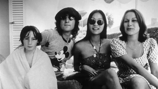 Julian Lennon with John and May Pang and a friend