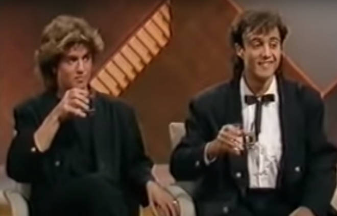Appearing on Wogan in 1984, George Michael and Andrew Ridgeley sat side-by-side on stage as the legendary TV host grilled them on their huge success with Wham!.