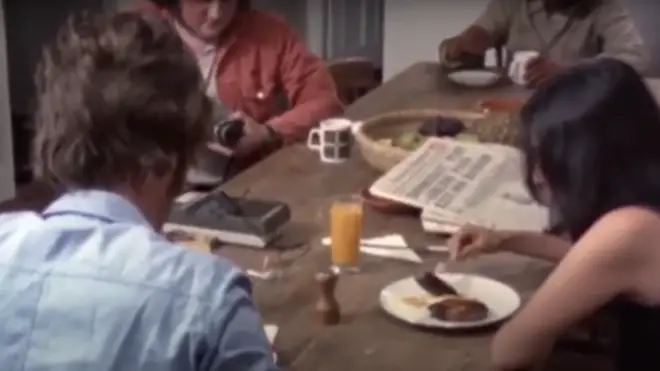 The footage then cuts to the incredible moment the fan is invited into the house and is filmed sitting at the dining room table with John and Yoko, while they all eat a meal together.