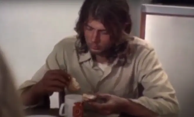 Curt is seen eating soup at the dining room table with John and Yoko at the and of the video