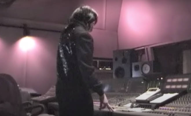 The footage shows Michael Jackson in a way the public rarely got to see him, relaxed and focused on making music. Pictured, Michael Jackson at the mixing desk.