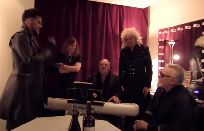 The footage, posted by Queen's official YouTube account, sees Adam Lambert singing with Brian May and Roger Taylor as the trio warm-up before a concert.