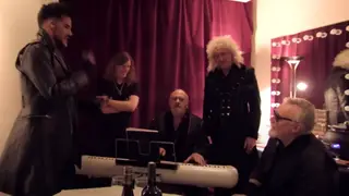 The footage, posted by Queen's official YouTube account, sees Adam Lambert singing with Brian May and Roger Taylor as the trio warm-up before a concert.