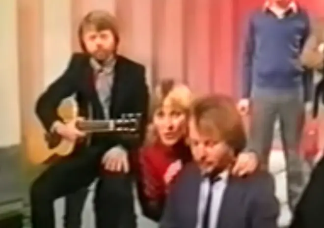 A lighthearted interview by Noel Edmonds was followed by an intimate performance of ‘Under Attack’ and ‘I Have A Dream’ by the four Swedish pop stars Agnetha Fältskog, Björn Ulvaeus, Benny Andersson, and Anni-Frid Lyngstad.