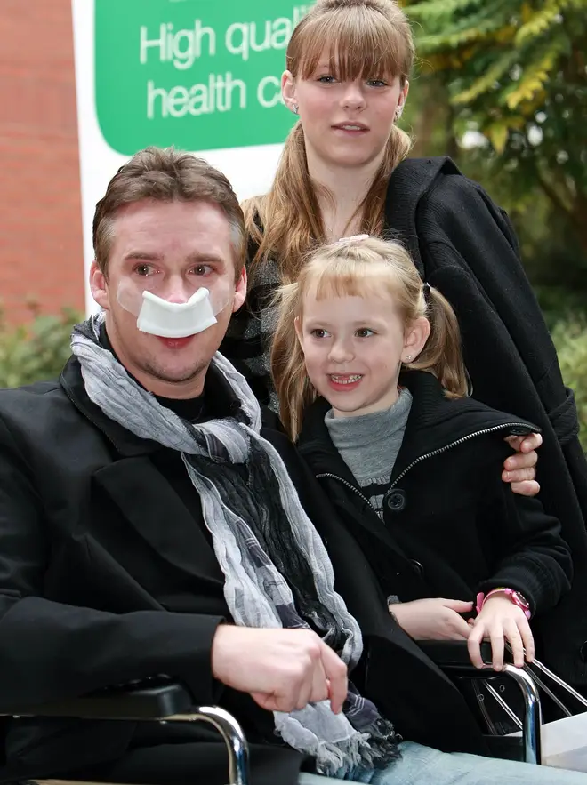 Russell Watson leaves hospital with daughters Rebecca and Hannah in 2007