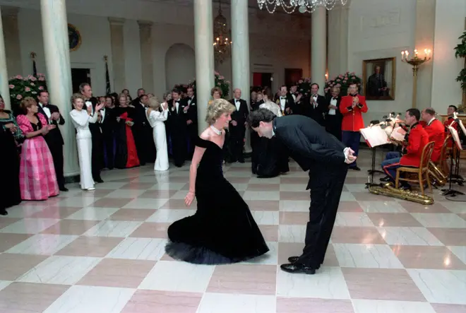 “I put my hand in the middle of her back, brought her hand down so that it wouldn’t be so high and gave her the confidence that we would do just fine," John Travolta later said.