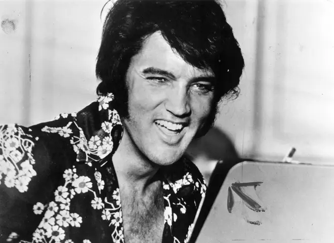 Dolly Parton said if she could have a "last conversation" with anyone in history, it would be Elvis Presley. Pictured, The King in 1975.