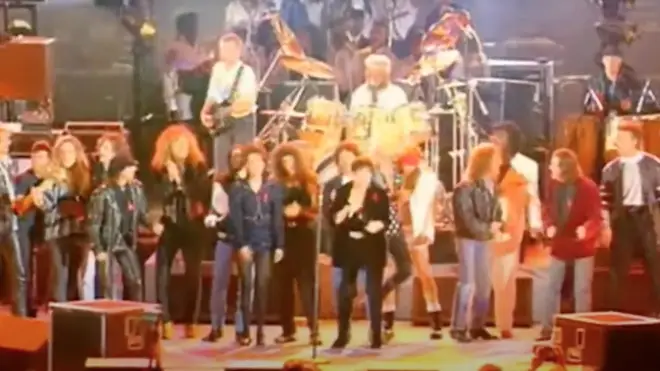 Stars including Lisa Stansfield, Seal, George Michael, Paul Young, Axl Rose and Slash line up to sing 'We Are The Champions'