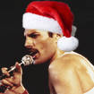 The special recording from 1977 captures the atmospheric audio of Queen's Freddie and Brian May performing an acoustic version of the festive classic to the audience in Inglewood, California. (Pictured, Freddie Mercury performing in 1982)