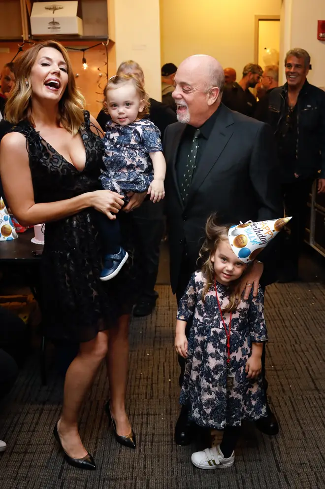 Billy Joel with wife Alexis and daughters Remy and Della in 2019