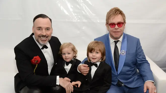 Elton and David with their sons in 2015